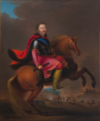 Obraz olejny na płótnie. Ukazuje Jana III Sobieskiego pod Wiedniem. Król ubrany w barwny strój historyczny, siedzi na wspiętym koniu. Widzimy, że gotowy jest ruszyć w kierunku bitwy, która ukazana została na dalszych planach, w dolnej partii kompozycji. Daleko na horyzoncie, zza kłębów dymu, wyłania się błękitna panorama miasta.
